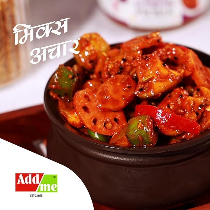 Spicy dish with lotus stems and green peppers in a brown bowl, with 'Add Me' branding.