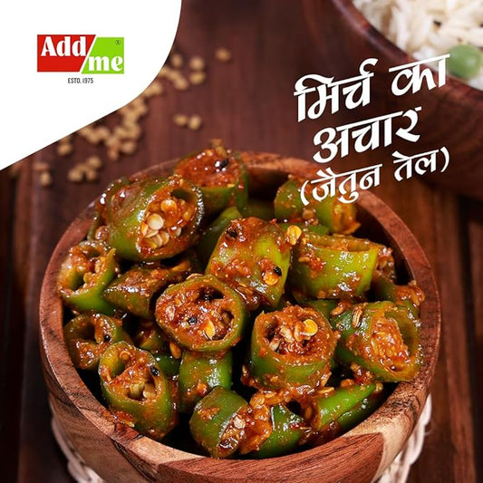 Wooden bowl of green okra dish with Addme logo and text in a foreign language.