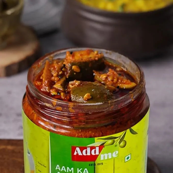 Jar of Add Me aam ka chutney with a blurred background