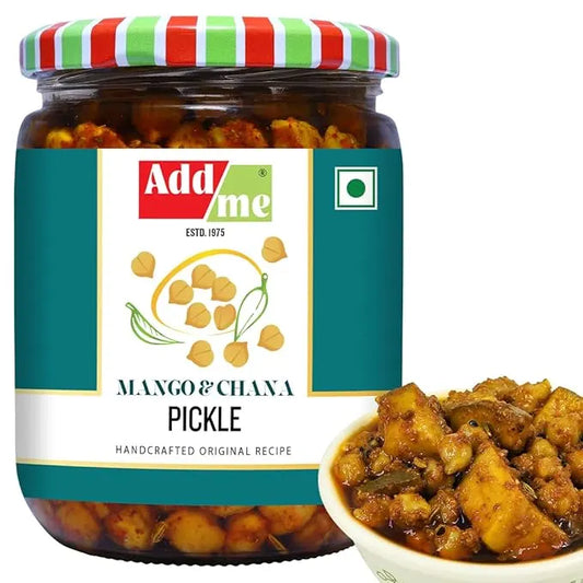 Jar of Add me Mango & Chana Pickle with a bowl of pickled vegetables on a white background