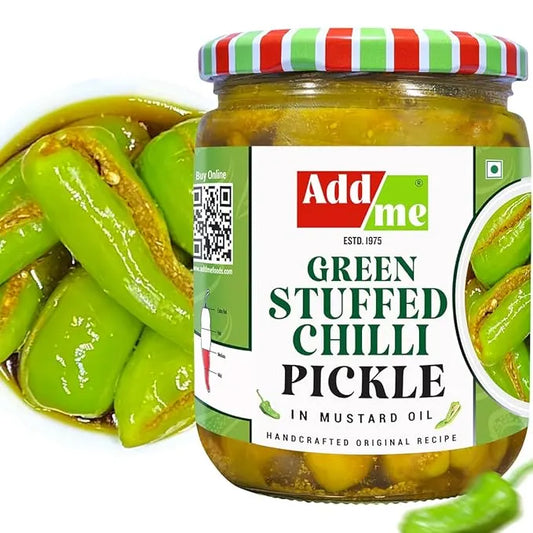 Jar of green stuffed chili pickle with a colorful lid and 'Add me' label.