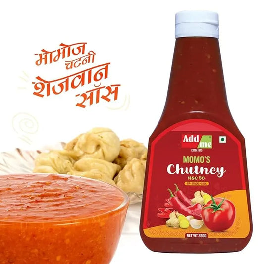 Bottle of Addmore Momo's Chutney with a bowl of chutney and momos on a white background