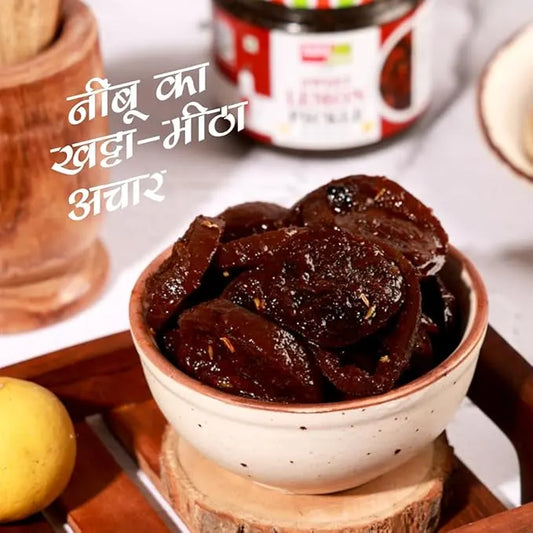 Bowl of "Lemon Pickle (Nimbu Ka Achar)" on a wooden stand with text overlay