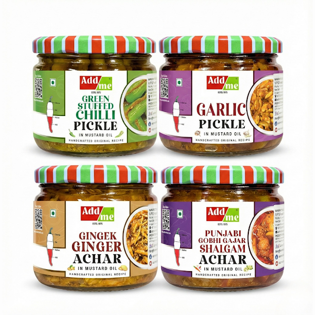 Four jars of different pickles with colorful lids on a white background.
these are green stuffed chilli pickle, Garlic pickle, Ginger pickle and Punjabi gobhi gajar shalgam pickle.