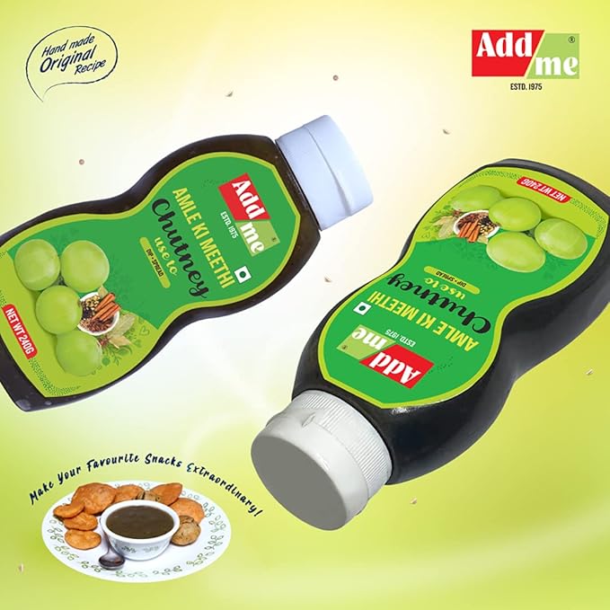 Two bottles of Add Me Apple Kimithi Chutney on a yellow background with food items.
