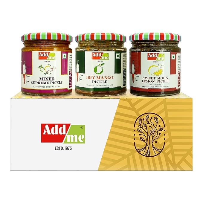Three jars of Add Me pickles on a branded box with the Add Me logo.