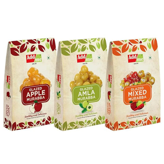 Three packages of Add Me Glazed Murabba with different flavors on a white background