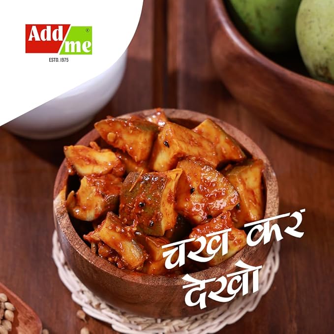 Wooden bowl of aubergine dish with 'Add Me' logo and text in the background