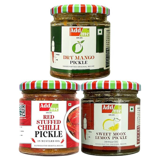 Three jars of Add Me pickles with colorful lids on a white background
