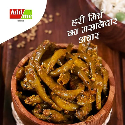 Wooden bowl of green chilies with spices and Addme logo on a brown background