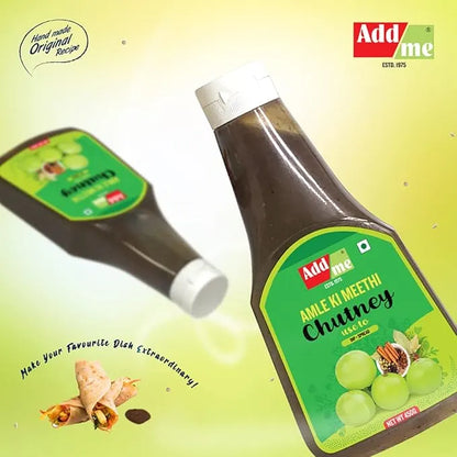 Two bottles of Add Me Amla Ki Meethi Chutney on a green background with branding and product details.
