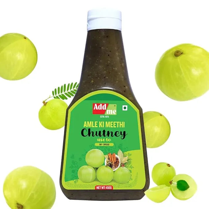 Bottle of Add Me Amla Ki Meethi Chutney with gooseberries on a white background