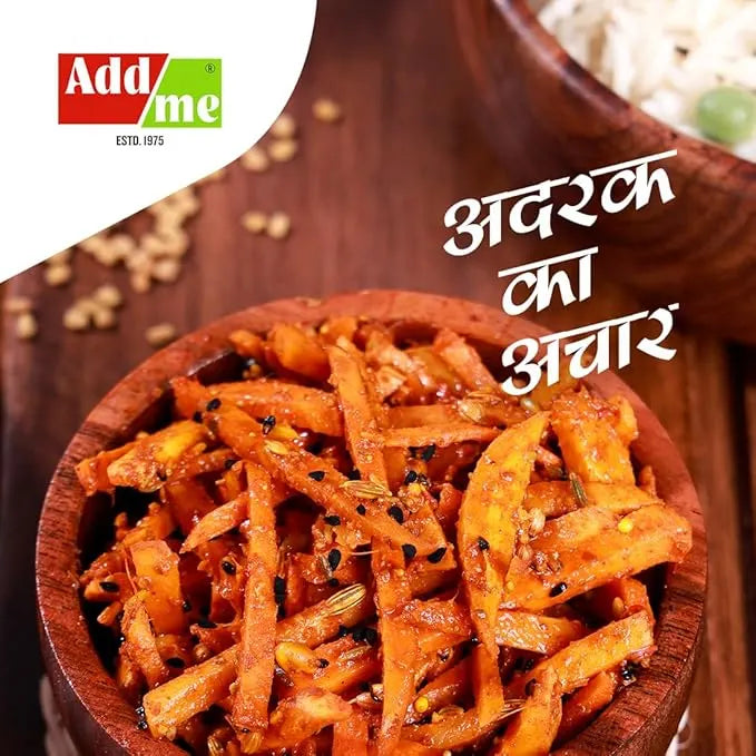 Spicy carrot sticks in a wooden bowl with 'Add Me' branding and text.