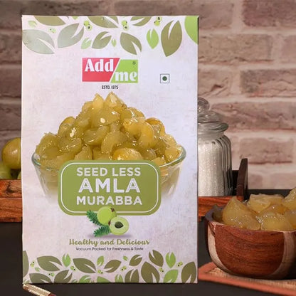 Add Me Foods: Packaging of Add Me Seed Less Amla Murabba with a bowl of amla fruit in the background.