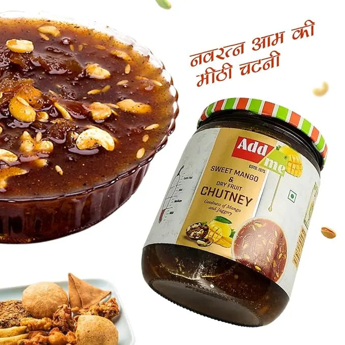 Jar of Add Some Sweet Mango Dry Fruit Chutney with a dessert and snacks on a white background