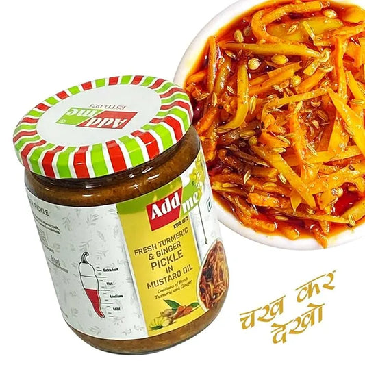 Jar of Add Me pickles with a bowl of mustard oil pickle on a white background