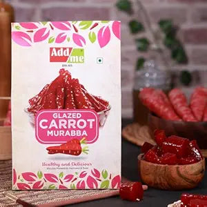 Add Me Foods: Box of Add Me Glazed Carrot Murabba with carrots and a bowl of the product on a wooden surface.