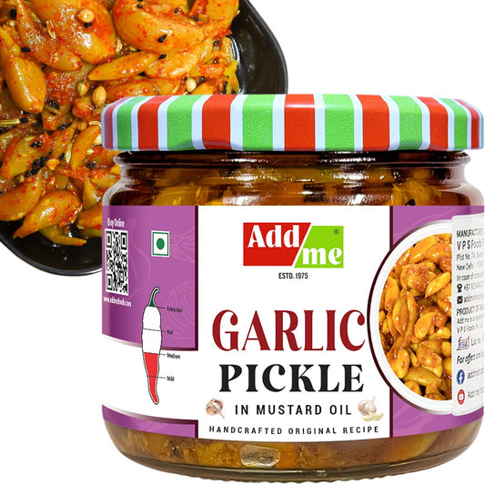 Jar of AddaMe Garlic Pickle with a colorful lid on a white background