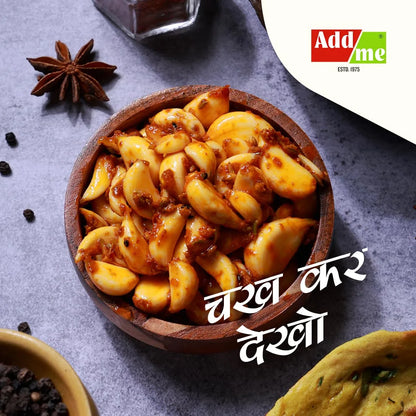 Wooden bowl of pasta with Addme branding on a gray background