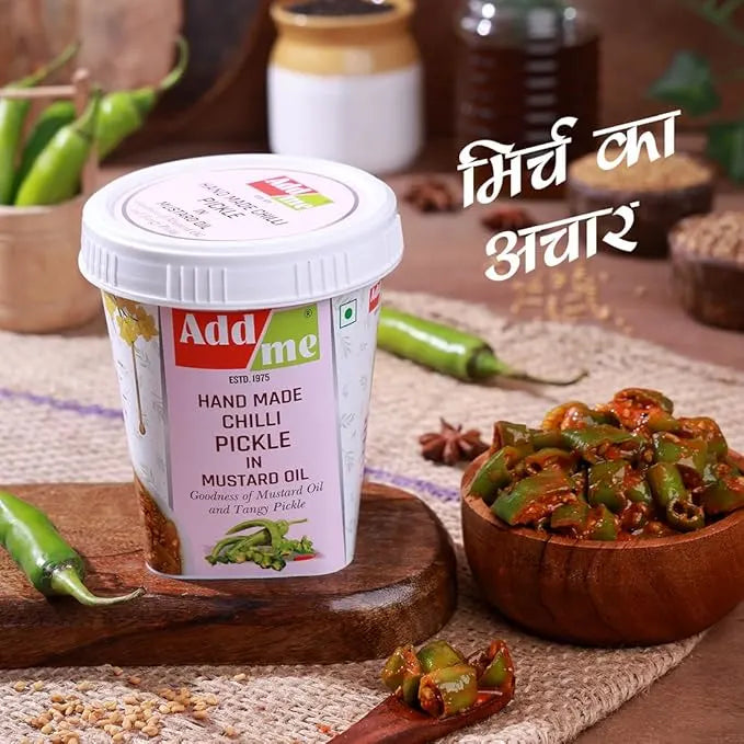 Add Me hand made chilli pickle container with pickles on a wooden surface