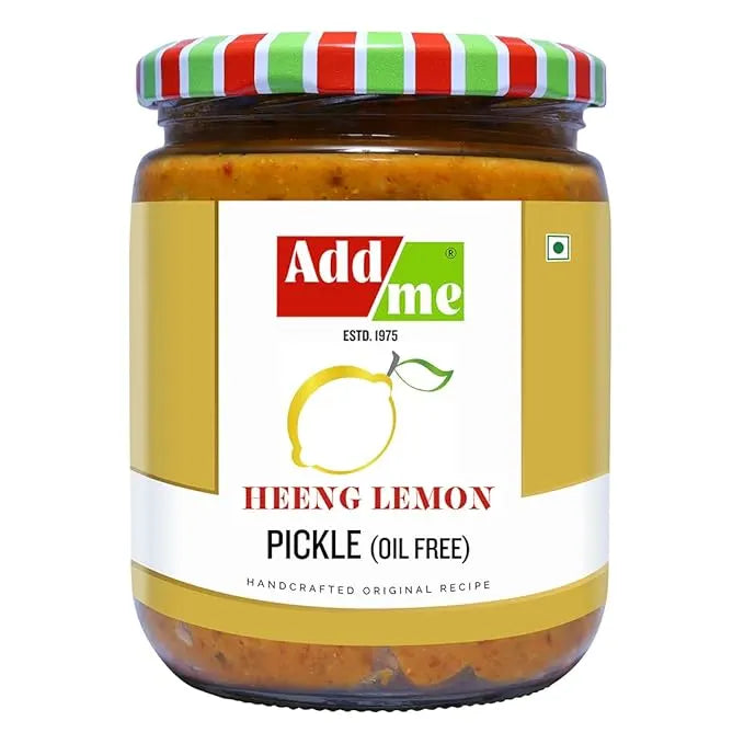 Jar of Add Me Heeng Lemon Pickle with colorful lid on a white background