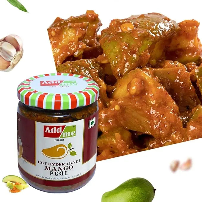 Jar of Add Me Hot Hyderabadi Mango Pickle with a dish of pickled mangoes in the background.