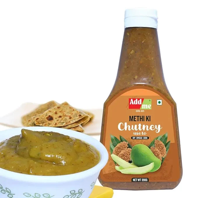 Bottle of Add Me Methi Ki Chutney with a bowl of chutney and flatbreads on a white background