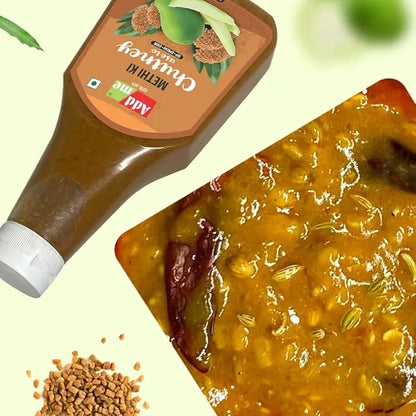 Bottle of Chilka Raw Mango Pickle with a close-up of the pickle on a light green background