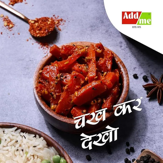 Spicy tomato dish in a wooden bowl with rice and spices on a gray surface, featuring Addme logo.