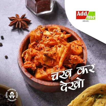 Wooden bowl of kimchi with spices and a cookie on a gray surface, featuring the Addme brand.