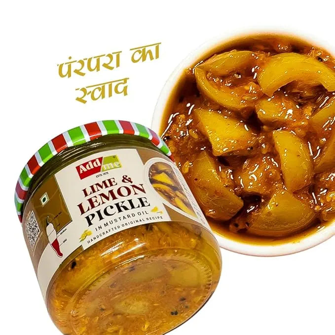 Jar of lime and lemon pickle with a bowl of curry on a white background