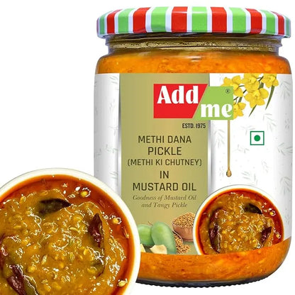 Jar of Add Me Methi Dana Pickle with a striped lid on a white background
