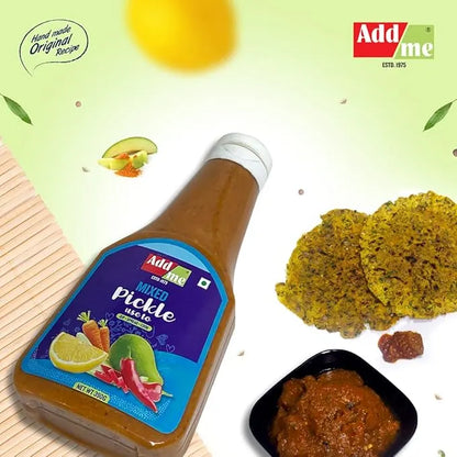Bottle of Add Me mixed pickle with a bowl of pickle and lemon slices on a green background
