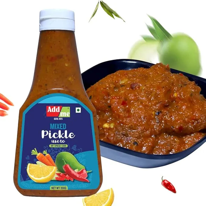 Bottle of Addmore Mixed Pickle with a bowl of pickle and ingredients on a white background