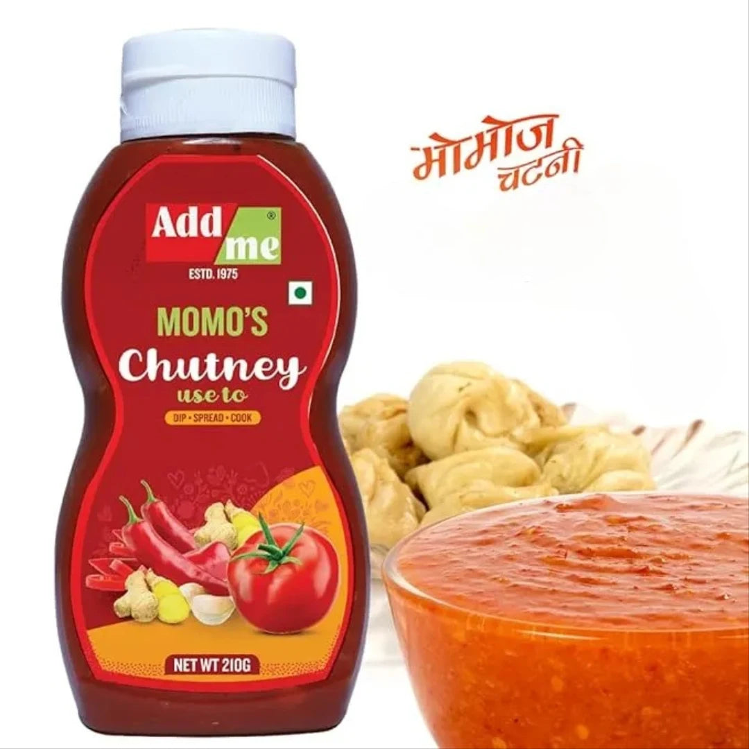 Add me Momo's Chutney bottle with a bowl of chutney and momos on a white background