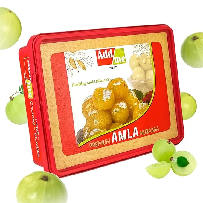 Add Me Foods: Red packaging of Add Me Premium Amla Murabba with green amla fruits around.
