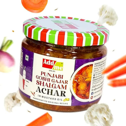 Jar of Add Me Punjabi Gobhi Gajar Shalgam Achar with colorful lid and ingredients around on a white background
