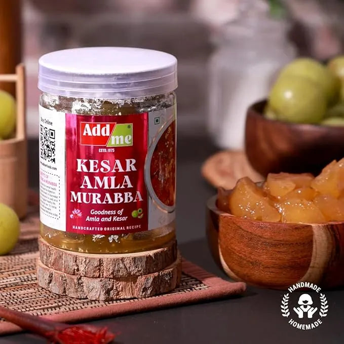 Jar of Kesar Amla Murabba with a red label on a wooden surface.