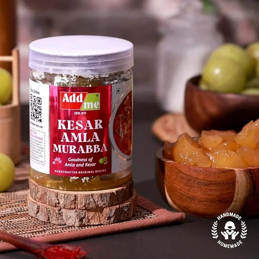 Jar of Kesar Amla Murabba with a red label on a wooden surface.