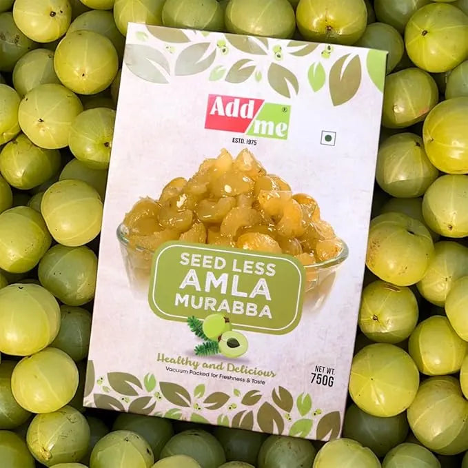 Add Me Foods: Packaged seedless amla murabba with Add Me branding on a background of green berries.