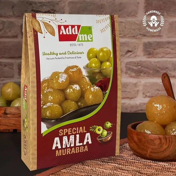 Add Me Foods: Packaging of Add Me Special Amla Murabba with a bowl of amla fruits on a rustic background.
