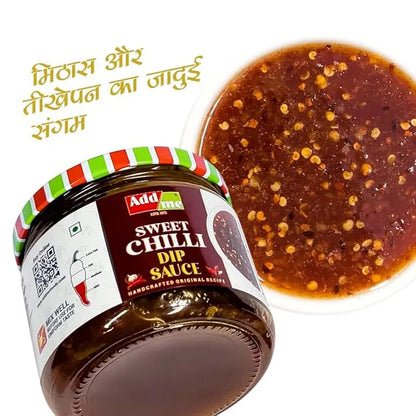 Add Me Foods: Jar of Add Me Sweet Chilli Dip Sauce with a bowl of the sauce on a white background