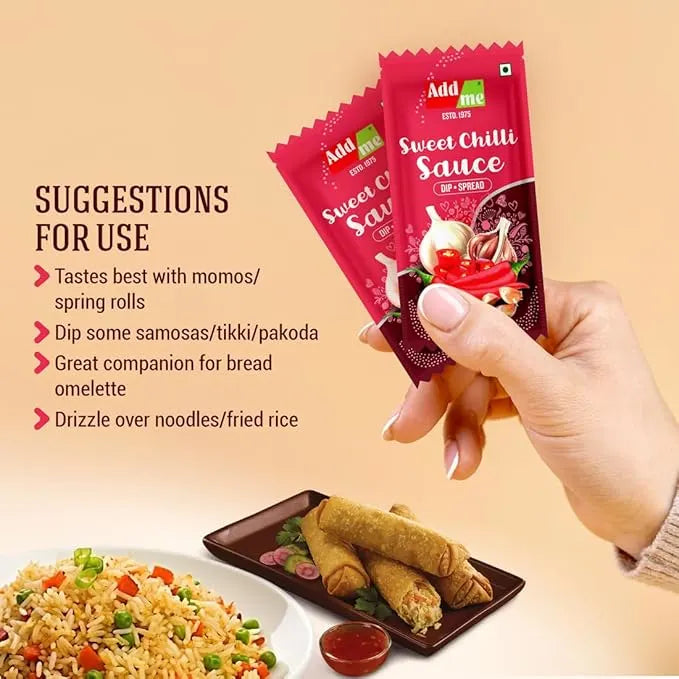 Add Me Foods: Hand holding a packet of Add Me Sweet Chilli Sauce with suggestions for use on a beige background