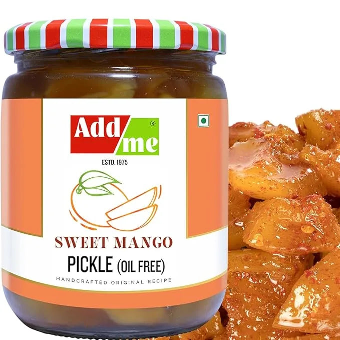 Jar of Add Me Sweet Mango Pickle with a close-up of pickles on a white background