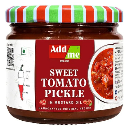 Jar of sweet tomato pickle with a colorful lid on a white background