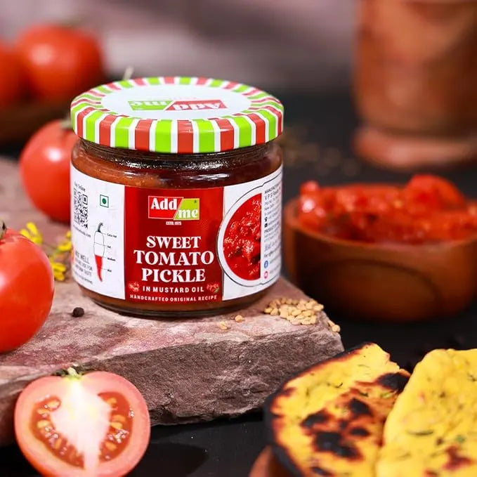 Jar of sweet tomato pickle with tomatoes and bread on a rustic background