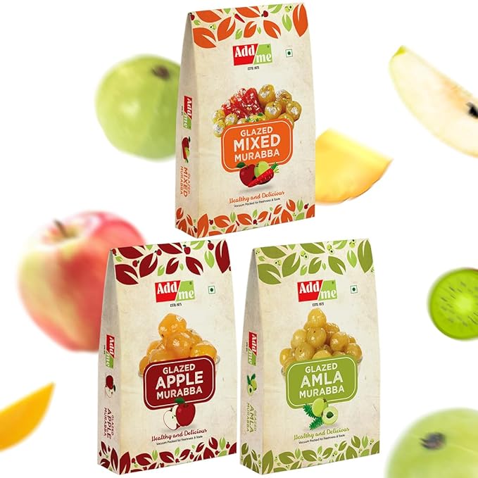 Three packages of Add Me Glazed Mixed Murabba, Glazed Apple Murabba, and Glazed Amla Murabba with fruits in the background.
