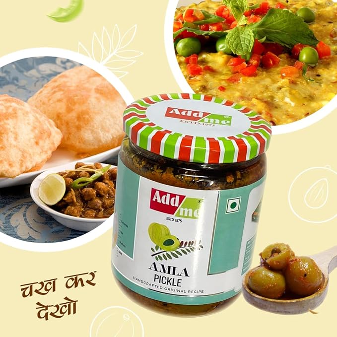 Jar of Adda Amla Pickle with Indian food items in the background. Seedless Amla Pickle 